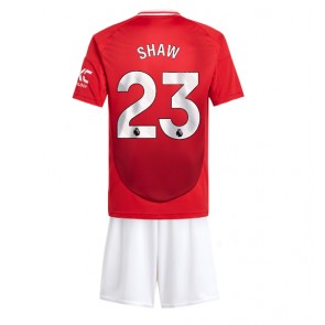 Manchester United Luke Shaw #23 Domaci Dres za Dječji 2024-25 Kratak Rukavima (+ kratke hlače)